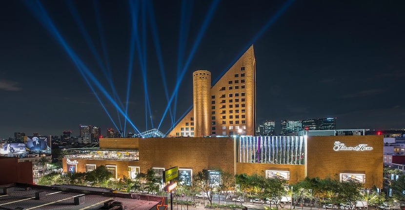 A pyramid-shaped tower soars above the massive El Palacio de Hierro department store in...