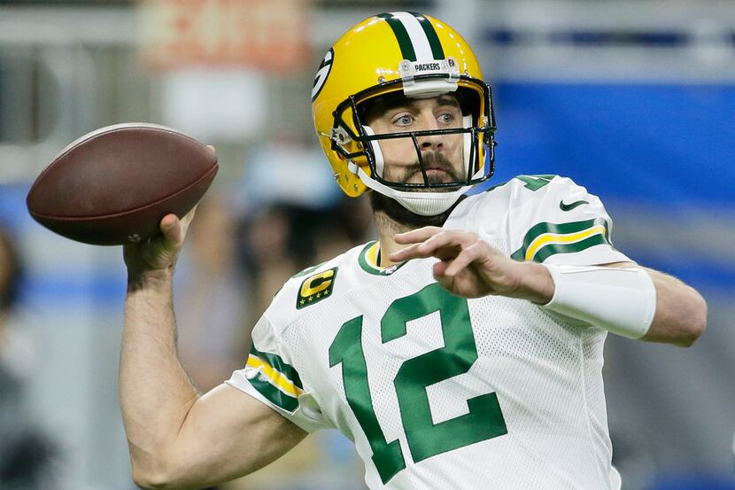 FILE - In this Dec. 29, 2019, file photo, Green Bay Packers quarterback Aaron Rodgers throws...