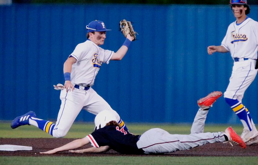The throw was too high for Frisco shortstop Tom Mulkern (5) to make the tag on Liberty pinch...