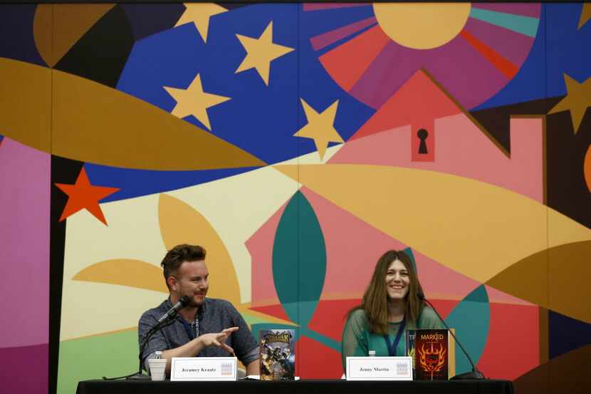 Authors Jeramey Kraatz (left) and Jenny Martin smile during the Young Adult Author Panel...