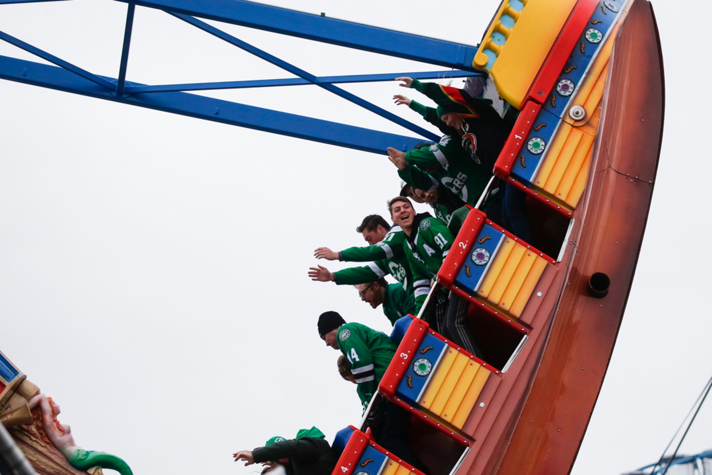Dallas Stars fans ride a fair ride prior to a NHL Winter Classic matchup between the Dallas...