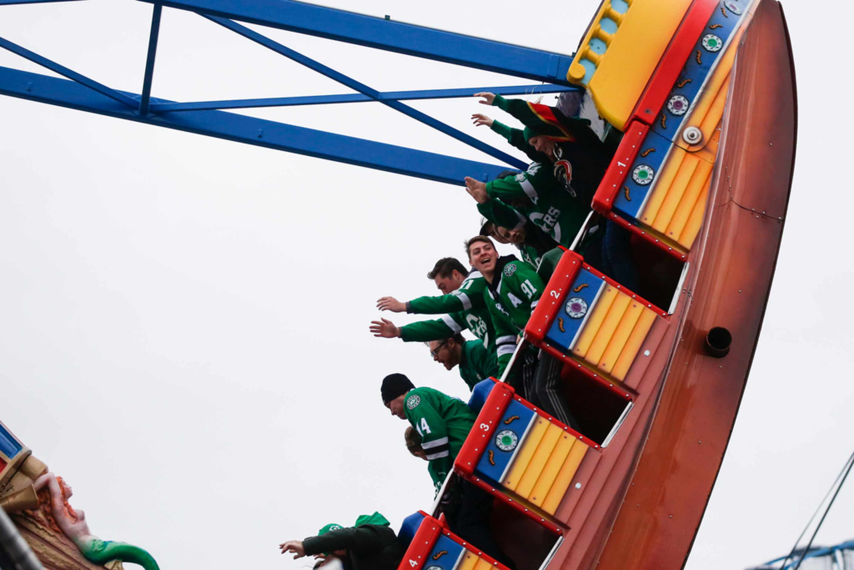 Dallas Stars fans ride a fair ride prior to a NHL Winter Classic matchup between the Dallas...