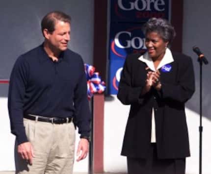  Vice President Al Gore is applauded by his campaign chairman, Donna Brazile, right, at the...