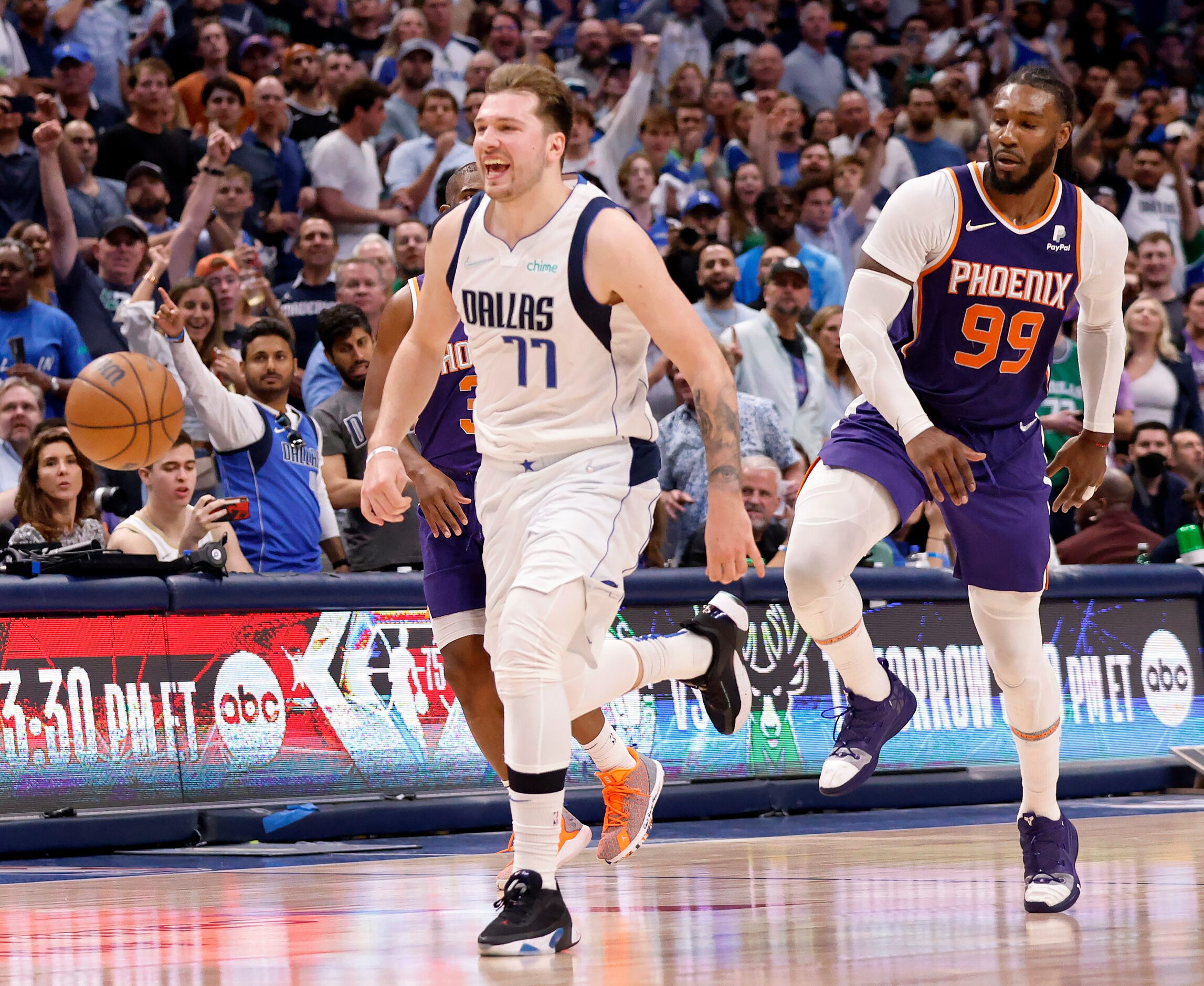 Dallas Mavericks guard Luka Doncic (77) reacts after being fouled in the fourth quarter by...