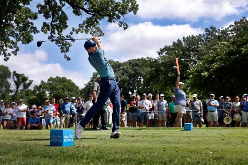Professional golfer Jordan Spieth fires his tee shot from the No. 3 tee box during round one...