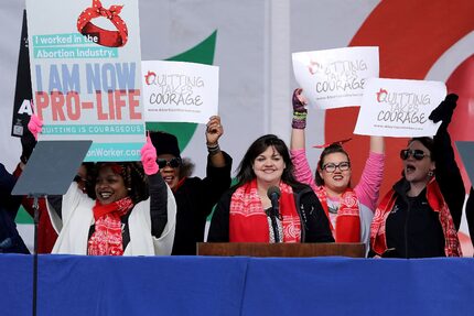 Abby Johnson (center) addressed a rally on the National Mall before the start of the 44th...