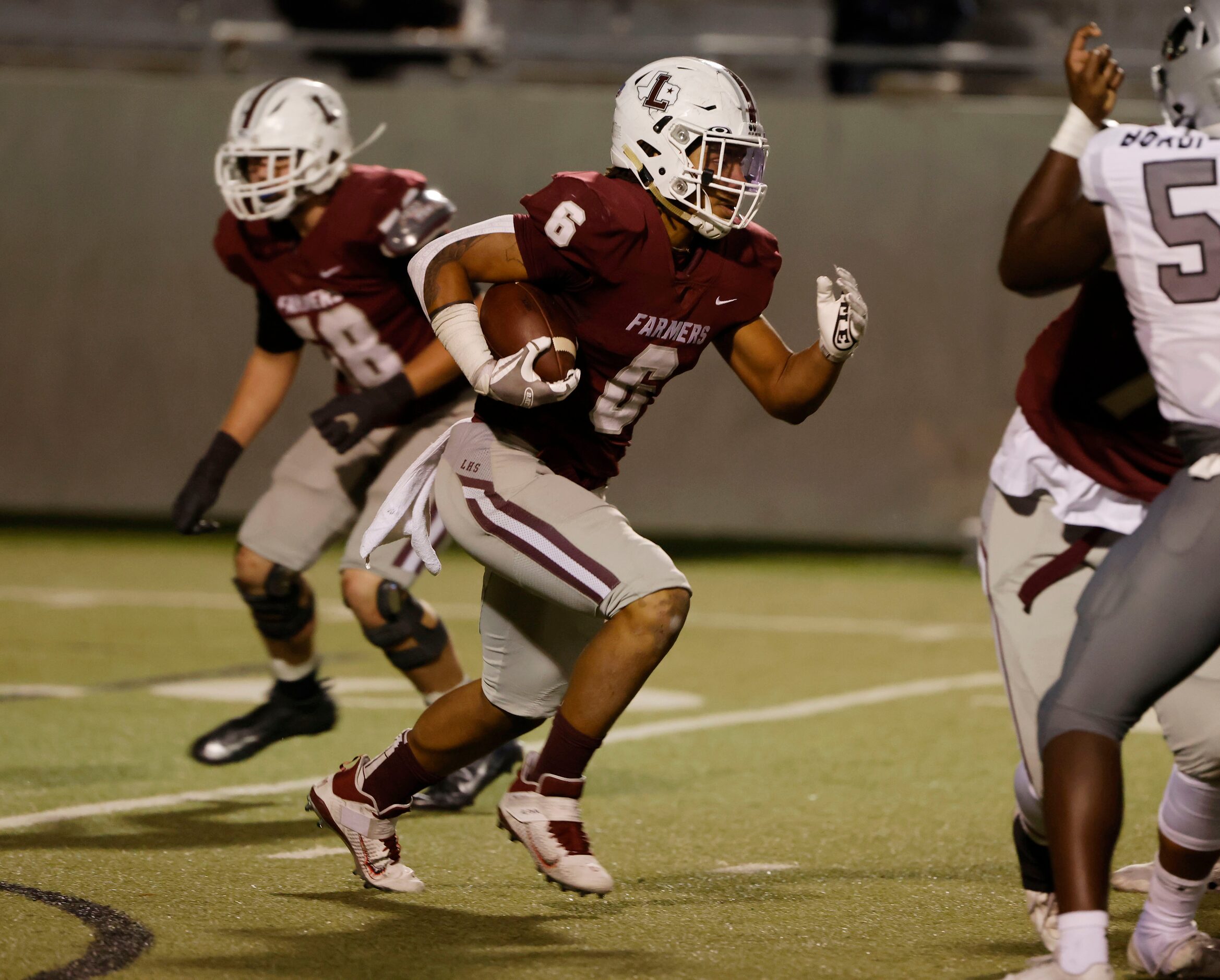 Lewisville running back Damien Martinez runs  against Arlington Martin during Class 6A...