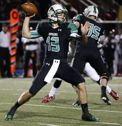 Southlake Carroll quarterback Mason Holmes (13) throw the ball in the first quarter during a...