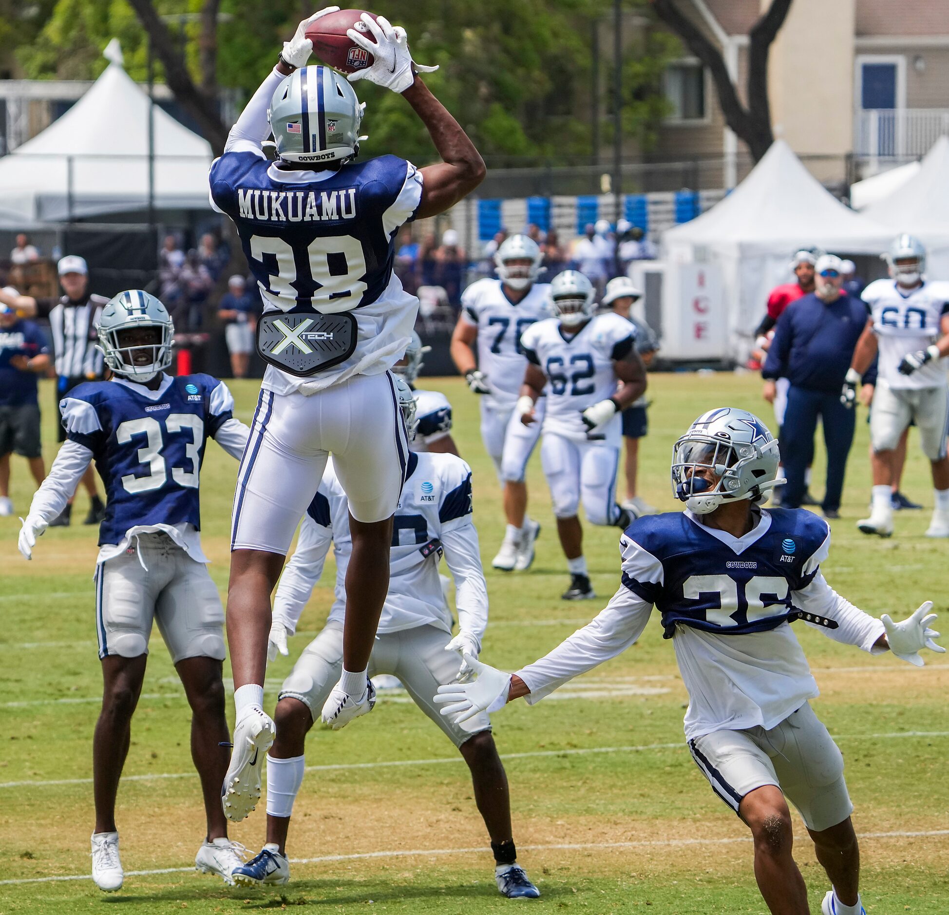 Dallas Cowboys cornerback Israel Mukuamu (38) intercepts a pass in a team drill during a...