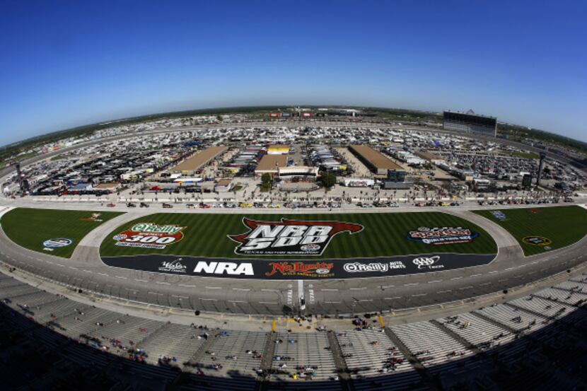 The NRA 500 logo appears on the infield as NASCAR Nationwide Series cars line up for...