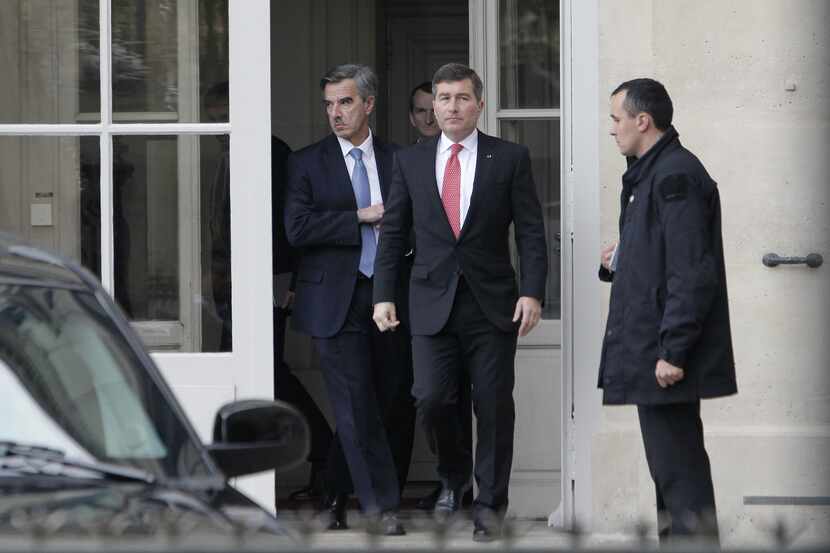 U.S Ambassador to France Charles H. Rivkin (right) leaves the Foreign Ministry in Paris,...