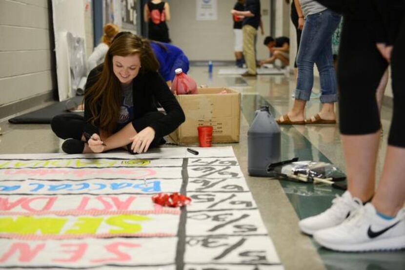 
Noelle Anderson works on a poster during leadership class. Creekview High School student...