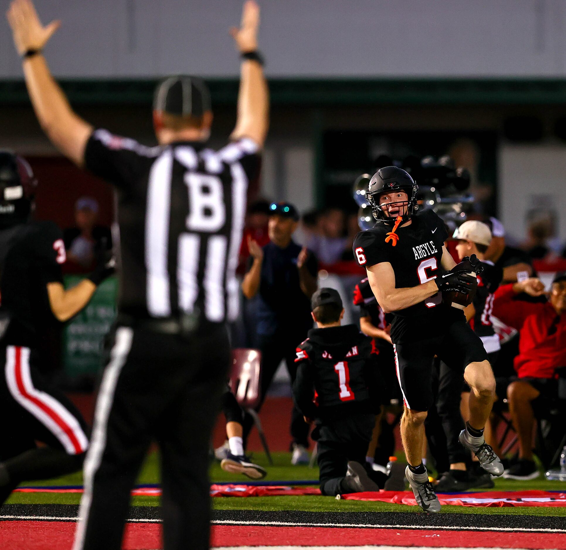 Argyle wide receiver Lane Stewart (6) gets into the endzone for a touchdown reception...