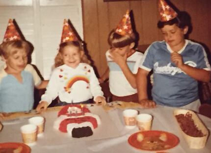 David Weigand (right), a West Virginia native, ​​​at a birthday party when he was around 11...