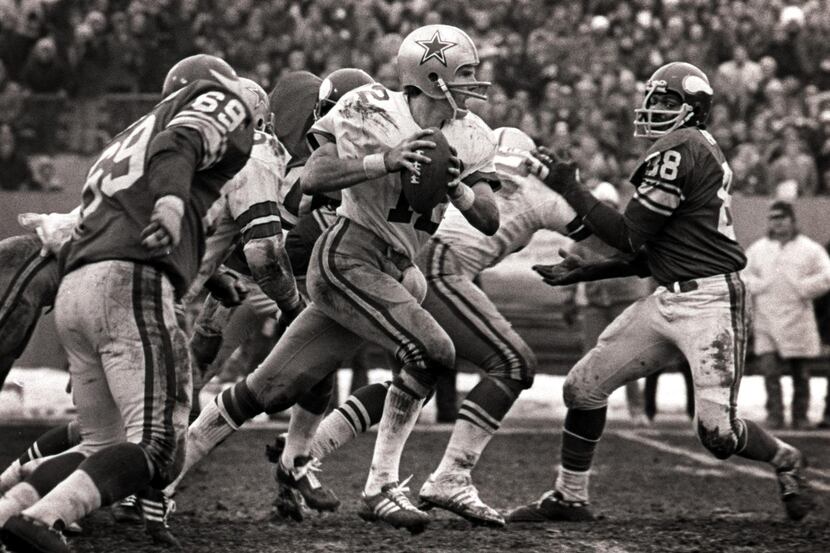Cowboys quarterback Roger Staubach (12) scrambles for yardage during the final minutes of...