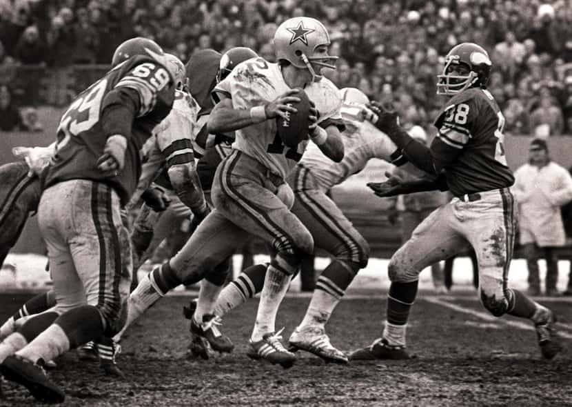 Cowboys quarterback Roger Staubach (12) scrambles for yardage during the final minutes of a...