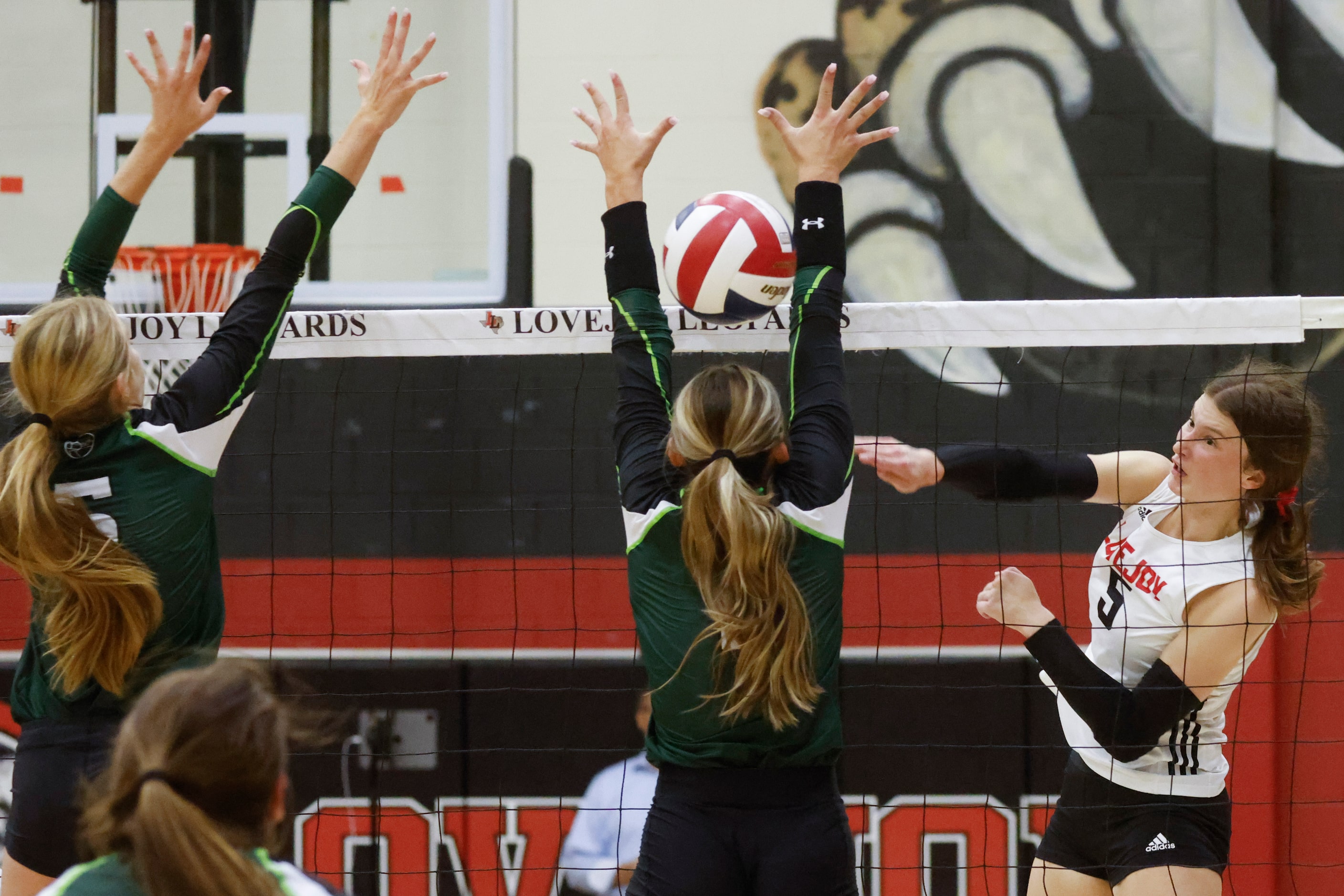 Lovejoy’s Morgan VanVoorhis digs the bal past Prosper’s blockers during a season-opening...