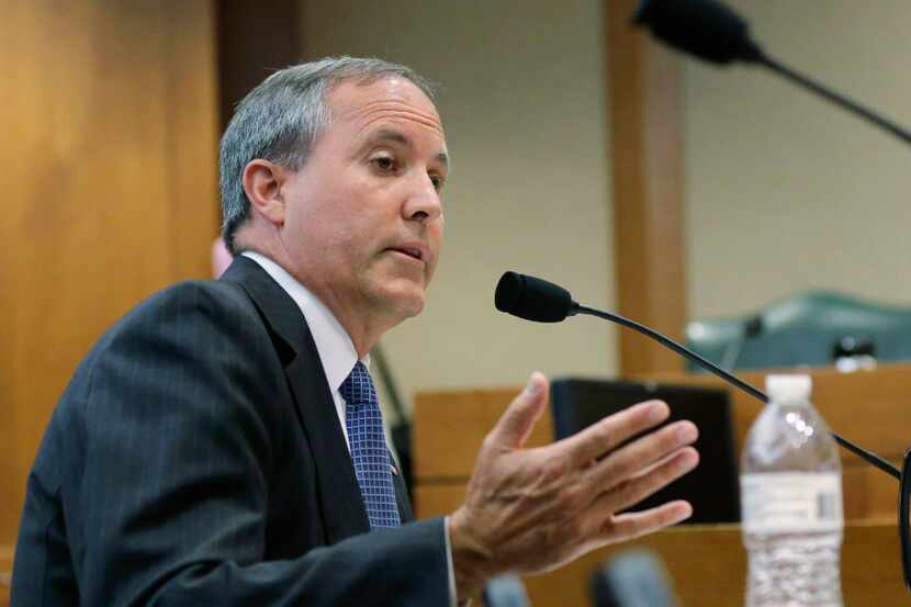 FILE - In this July 29, 2015, file photo, Texas Attorney General Ken Paxton speaks during a...