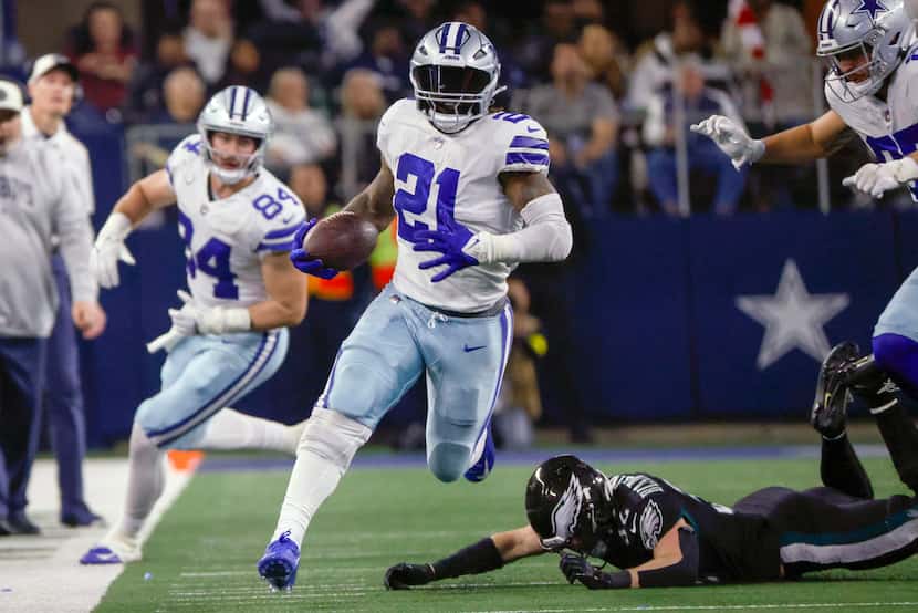 FILE - Dallas Cowboys' Ezekiel Elliott runs during the second half of an NFL football game...