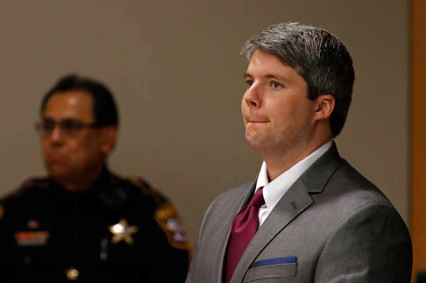 Defendant Jason Lowe stood Thursday during his murder trial in the death of his girlfriend,...