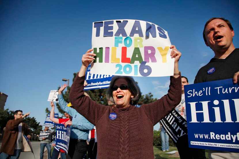 
Hillary Clinton supporters such as Nancy Baker Bryant, shown cheering Clinton when she...