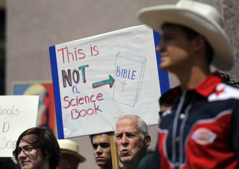 A 2013 file photo of pro-science supporters rallying prior to a State Board of Education...