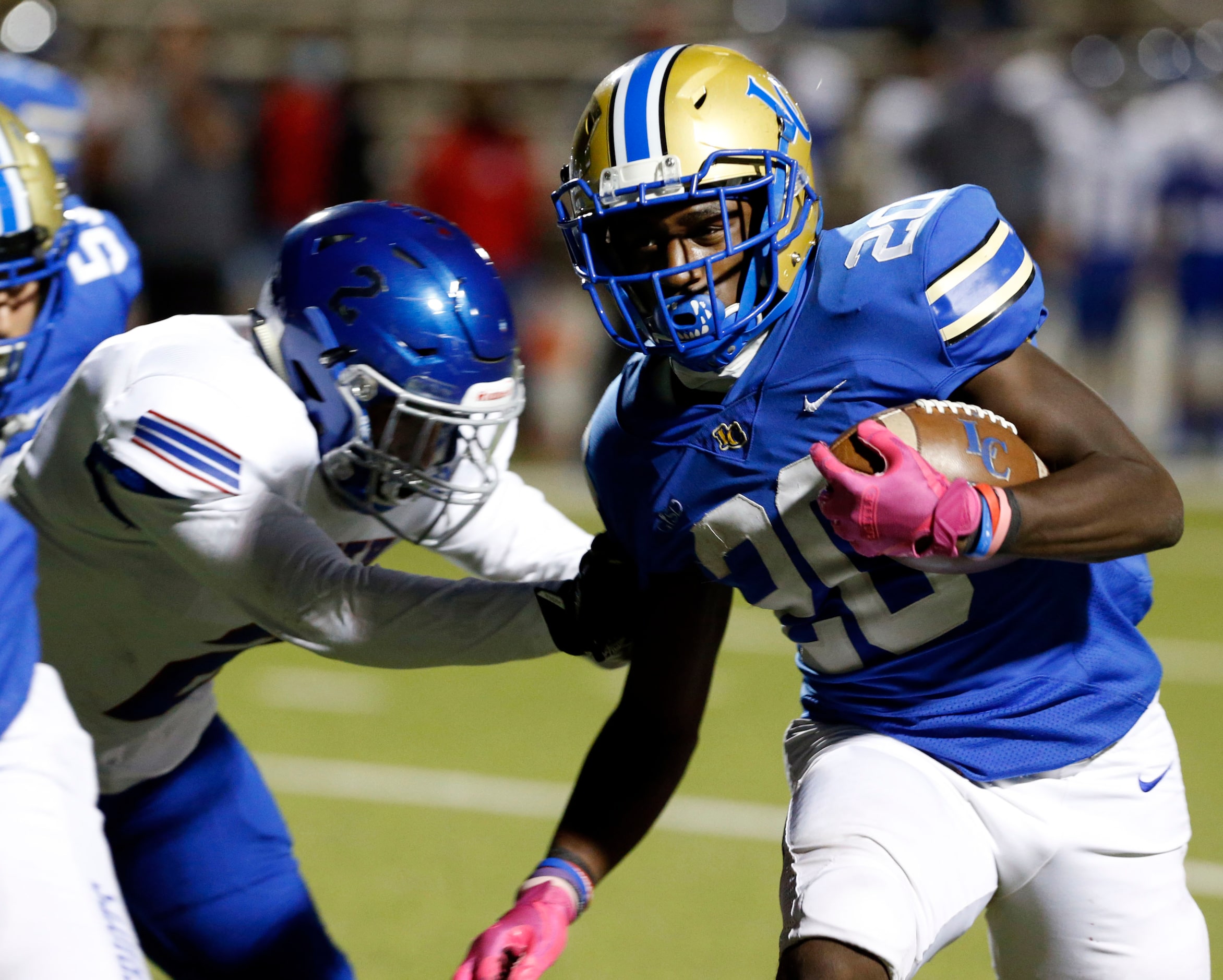 Lakeview’ RB Zecharian Dunston (20) rushes for a first down during the first half of high...