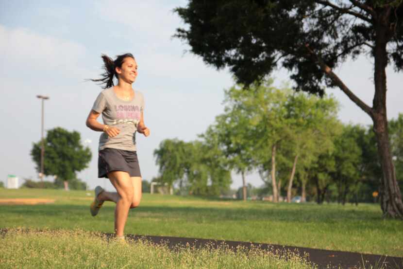 Veda Doubleday jogs along a trail near Brookhaven College in Farmers Branch. The city of...