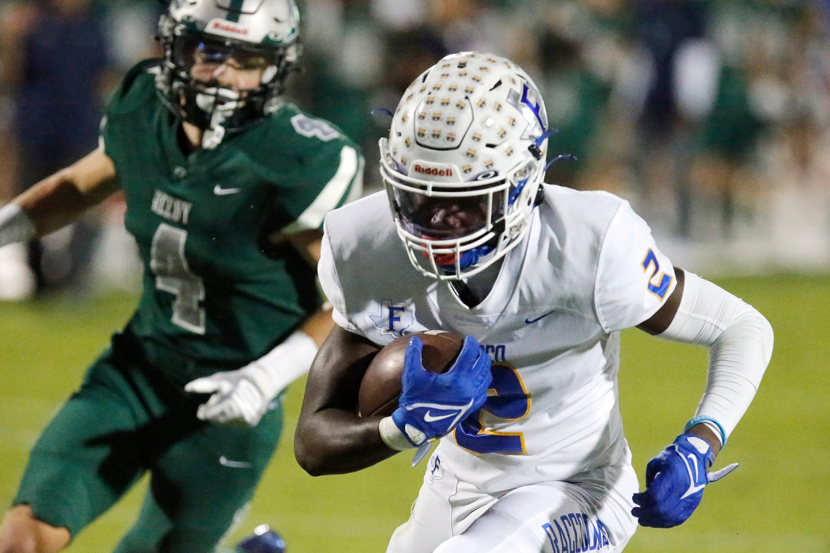 Frisco High School wide receiver Ismael Taylor (2) goes in for a touchdown during the first...