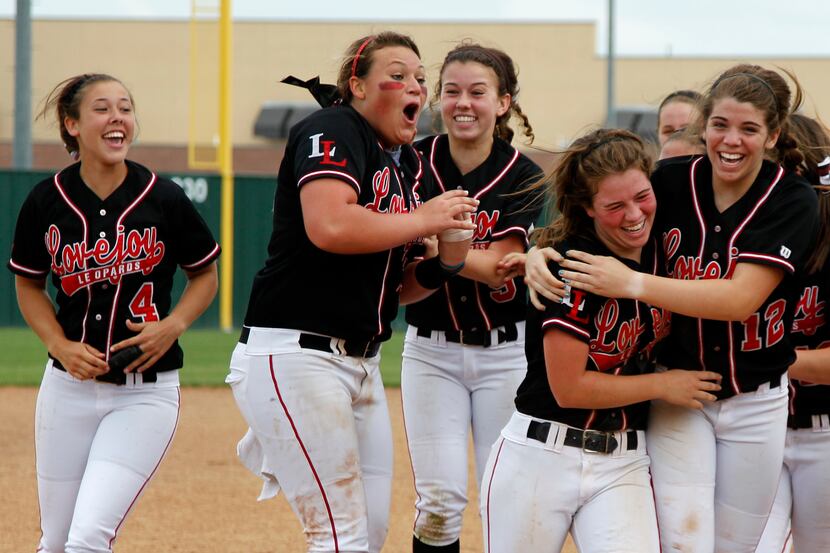 Lovejoy High School softball players, Stephanie Cunningham (4), from left, Brittany Lewis,...