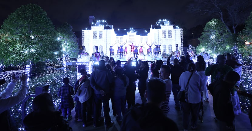 Hundreds waited in long lines to view the elaborate holiday display located at 6215 Deloache...