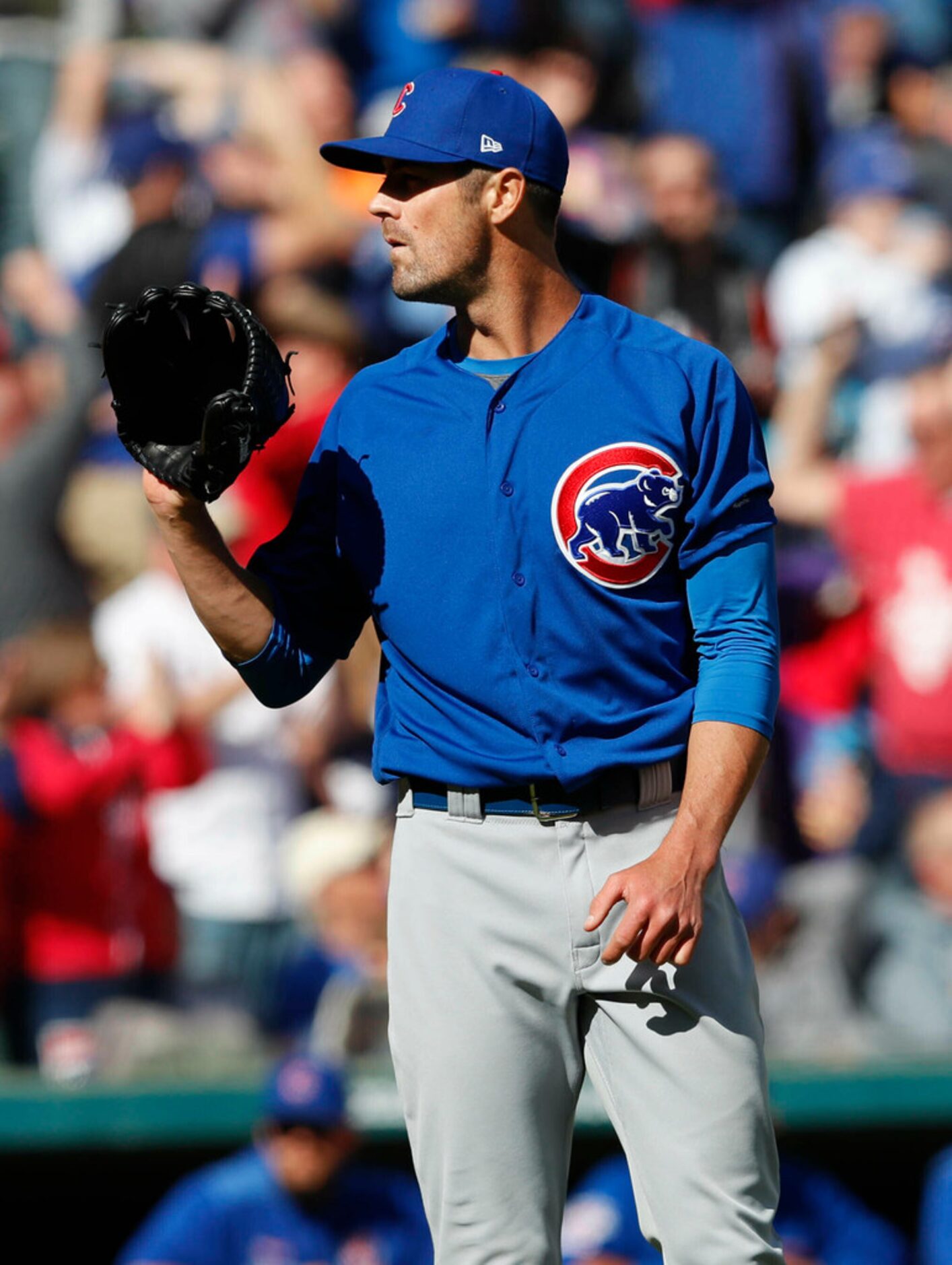 Chicago Cubs starting pitcher Cole Hamels calls for a new ball after giving up a grand slam...