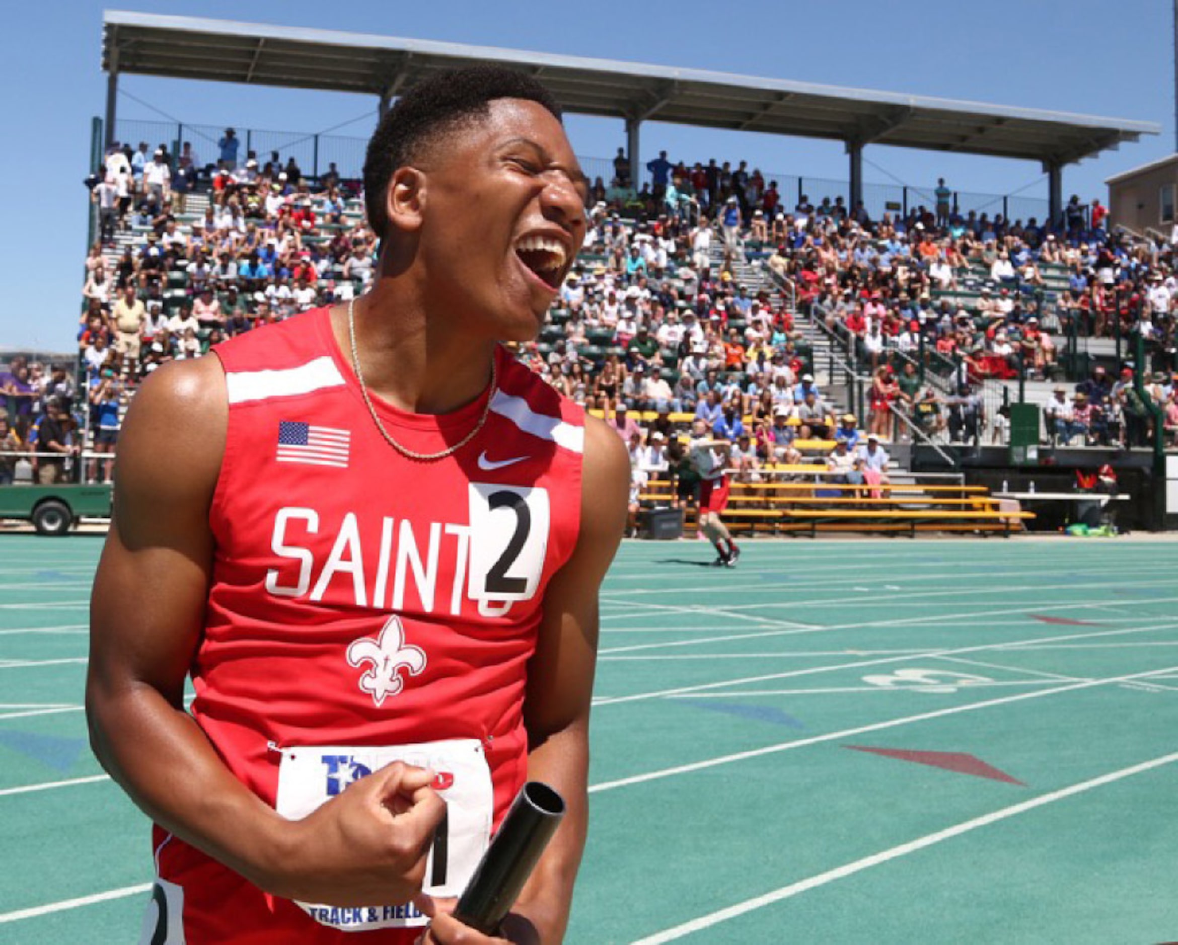 First Baptist Ryan Givens reacts to their first place win in the men's 2A  4X200 relay  at...