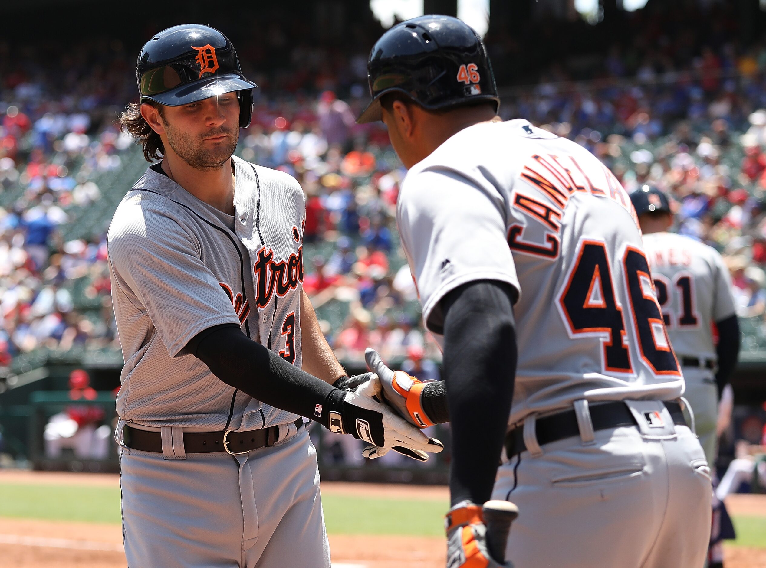 ARLINGTON, TX - MAY 09:  Pete Kozma #33 of the Detroit Tigers celebrates a homerun with...