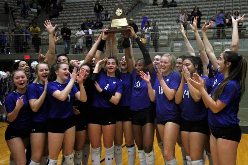 Trophy Club Byron Nelson celebrates a 25-17, 25-17, 25-16 victory over Denton Guyer in...