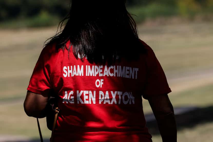 Jacqueline Wasson, a Denton County Republican precinct chair, wears a shirt that reads...