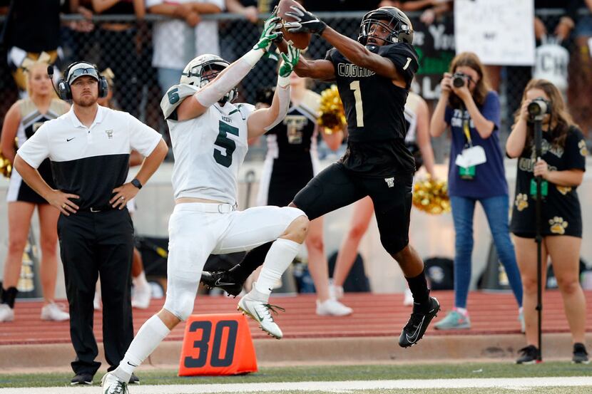 The Colony wide receiver Myles Price (1) goes high to snare the ball from Frisco Reedy...