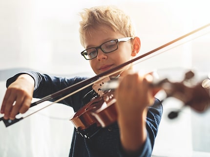 Child playing violin