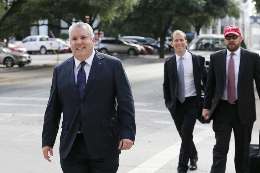 Marc Rylander, spokesman for the Texas attorney general, enters the courtroom where the...