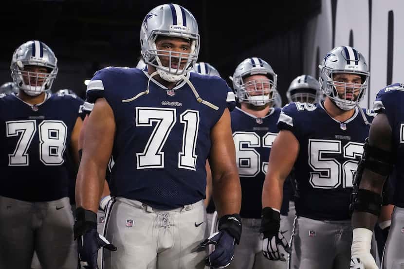 Dallas Cowboys offensive tackle La'el Collins (71) waits to take the field with offensive...