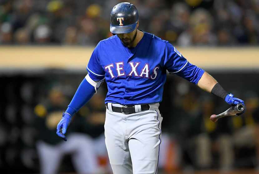 OAKLAND, CA - SEPTEMBER 22:  Joey Gallo (#13) walks back to the dugout after striking out...