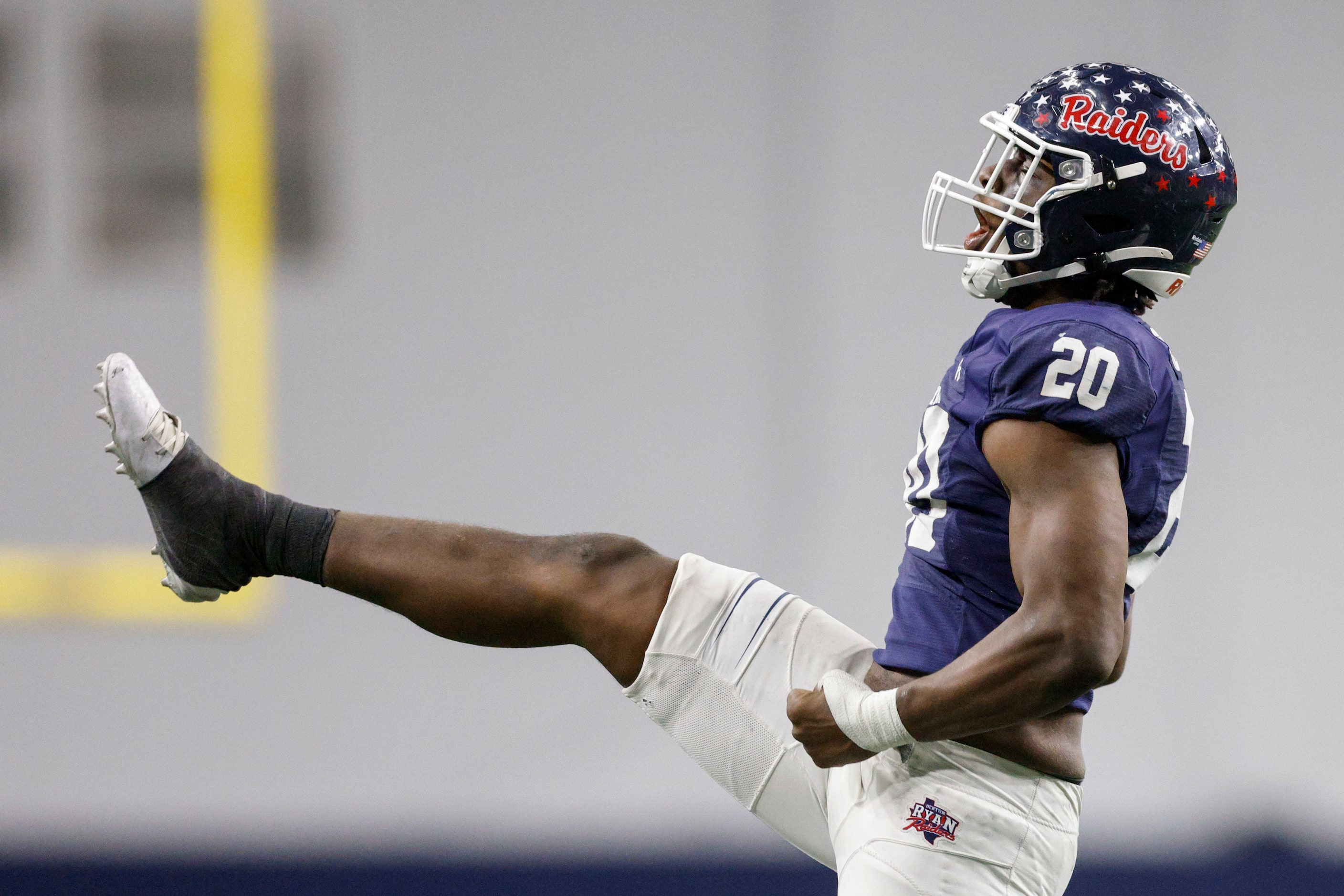 Denton Ryan defensive lineman Kha'Ron Freeman-Wade (20) celebrates after a sack during the...