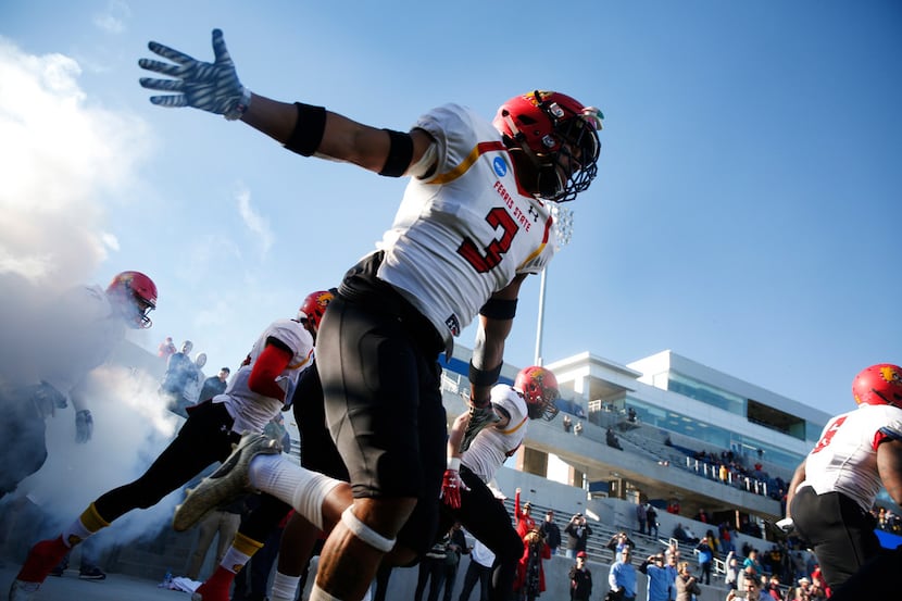 Ferris State Bulldogs Keyondre Craig (3) enters the field before the NCAA Division II...