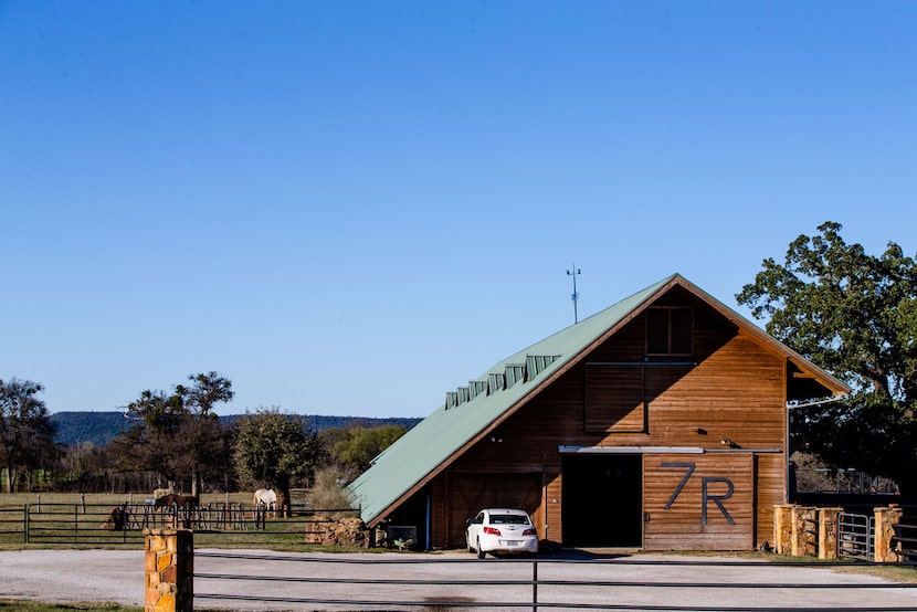 Horses grazed next to a barn on the 7-R Ranch in Gordon on Nov. 14. When successful Dallas...