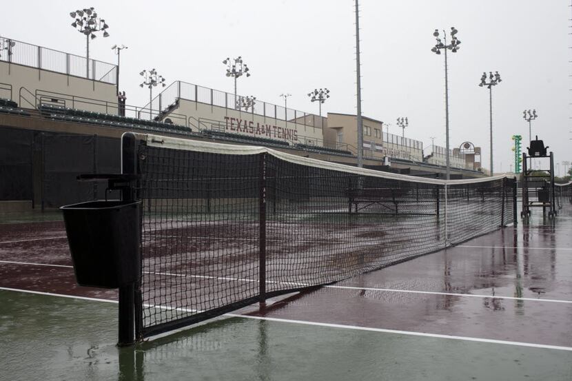 Rain delays the tennis matches at the Mitchell Tennis Center and Omar Smith Instructional...