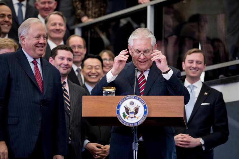Secretary of State Rex Tillerson, accompanied by accompanied by State Department...