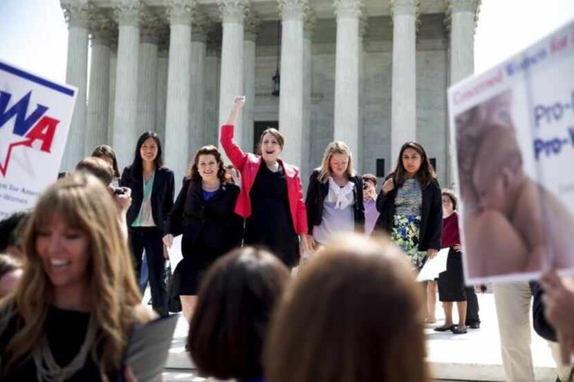 
Adele Keim (center) and other lawyers for Hobby Lobby heralded Monday’s Supreme Court ruling.
