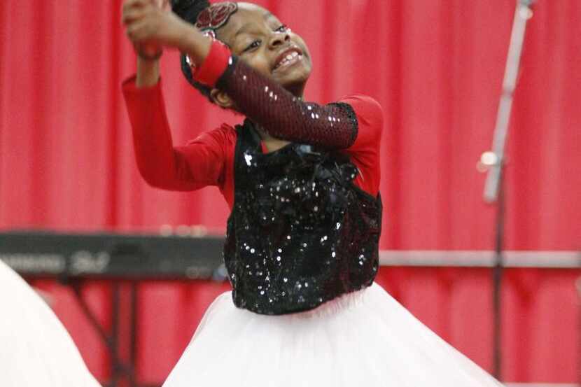 Denym Johnson,  8, danced with Ordered Steps Productions during the S.M. Wright Foundation’s...