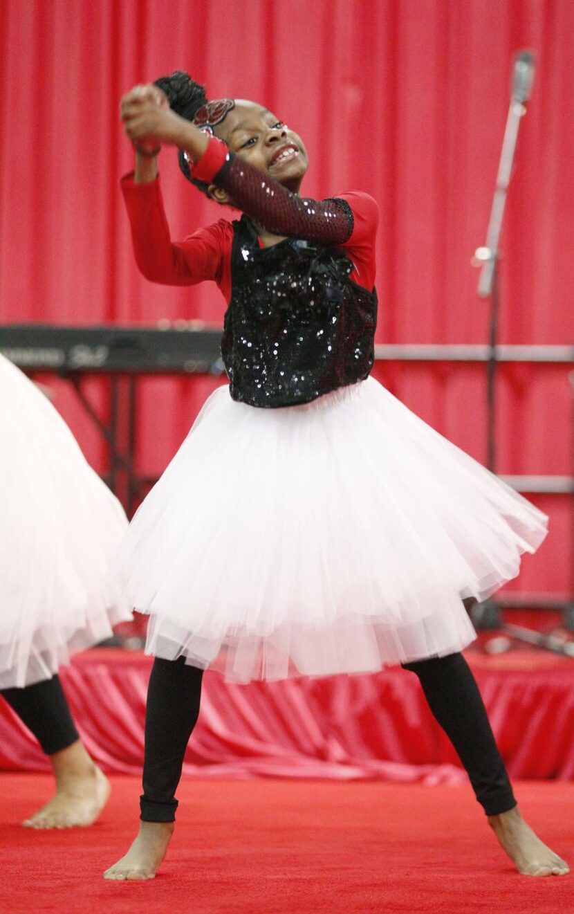 Denym Johnson,  8, danced with Ordered Steps Productions during the S.M. Wright Foundation’s...