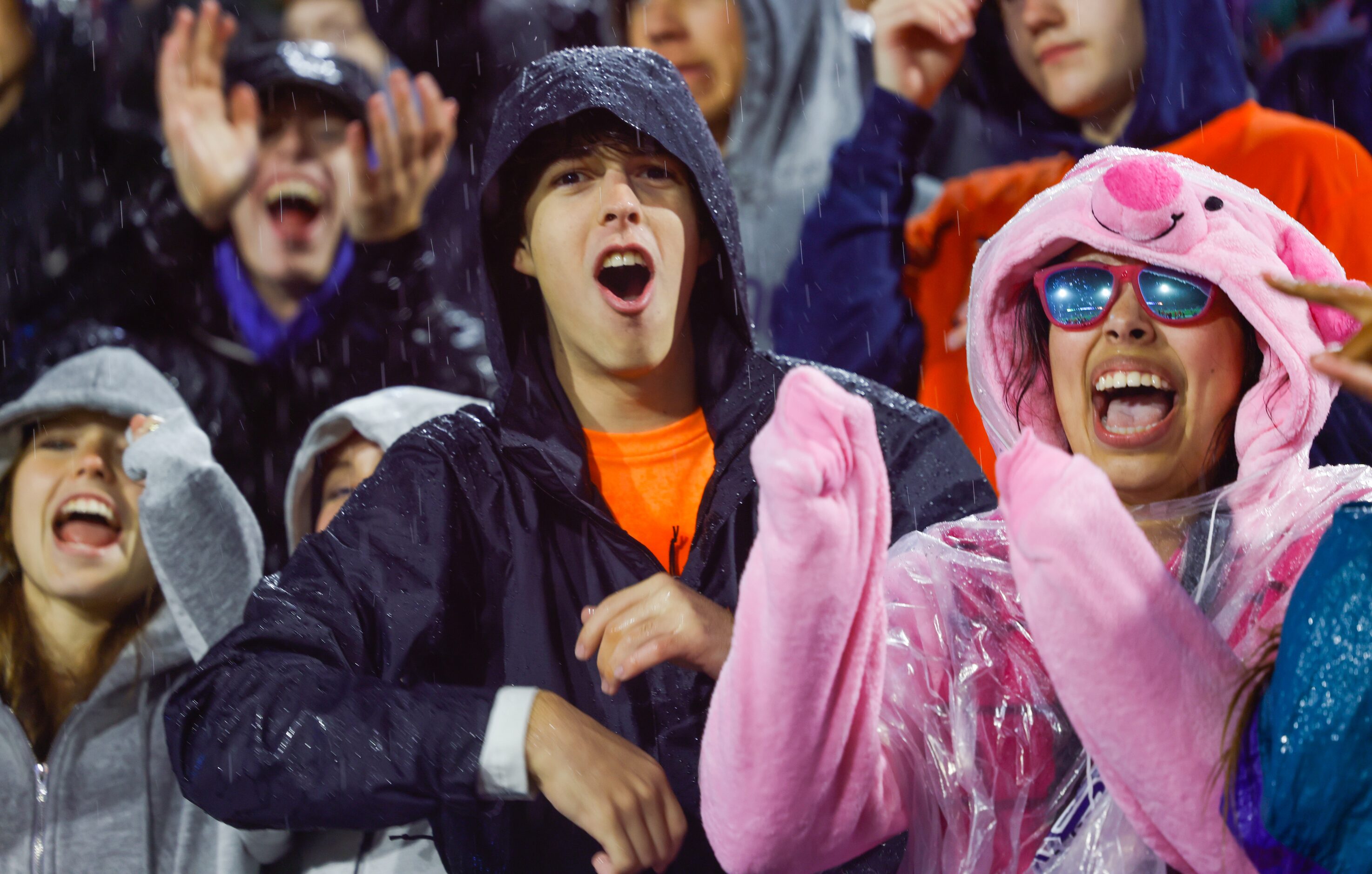 Bulldogs fans cheer on McKinney North as they enter the field to play Forney at the McKinney...